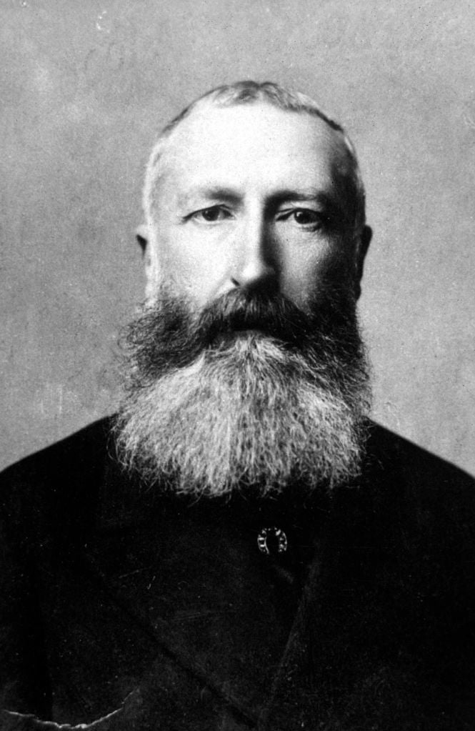 A historical portrait of Leopold II, King of Belgium from 1865-1909, with a full beard and formal attire