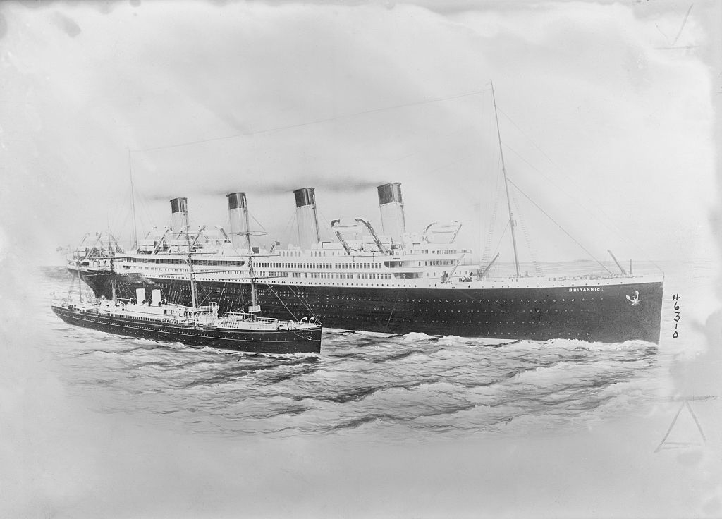 A vintage illustration of a large ocean liner at sea, accompanied by a smaller ship. No identifiable persons are in the image