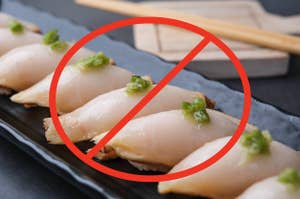 Sushi with wasabi on a black plate is crossed out with a red circle and line, indicating it is not recommended or banned