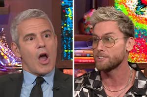 Andy Cohen, in a suit and tie, appears surprised next to Lance Bass, in glasses and a patterned shirt, during an interview