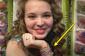 A young woman smiles, showcasing colorful Silly Bandz bracelets on her wrist