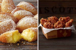 Donuts filled with custard and a box of fried chicken wings from Red Rooster on a wooden table